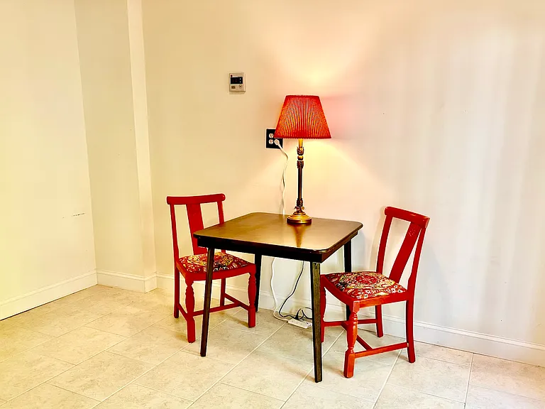 Small bistro table in the full basement area.