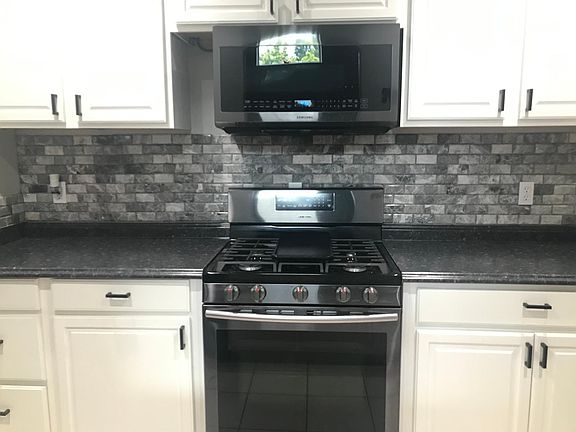 Lots of cabinets and counter space. Gas stove.