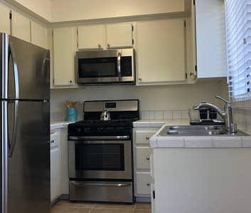 2nd image of 1506 S Barrington Ave #201