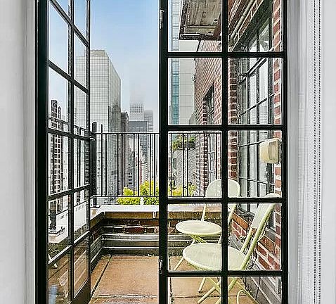 2nd image of 227 E 57th St APT 19B