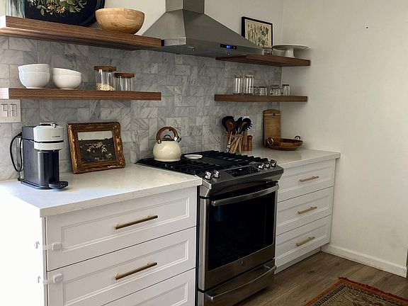 open shelving, new cabinets, marble backsplash