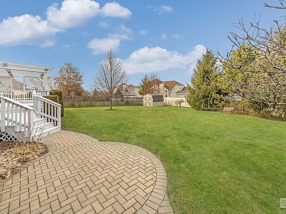 In addition to the awesome tiered deck, you'll enjoy this brick paver patio!