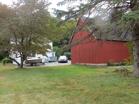 Part of barn, large driveway