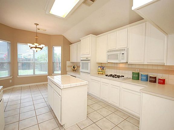 Large kitchen with island and lots of counter space!
