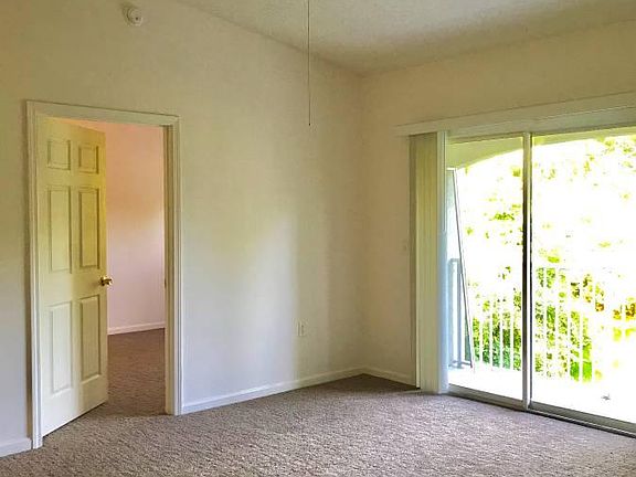 Living room view of Master bedroom and balcony
