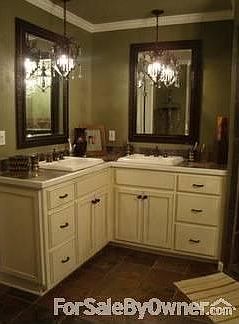 Master Bath
						:
						has huge walk in granite shower, custom cabinets, garden tub