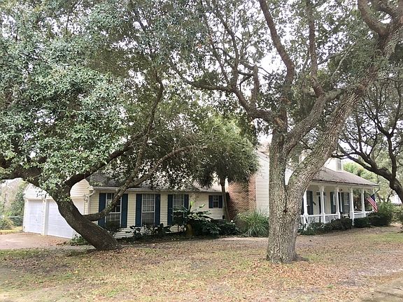 Front porch overlooks oaks