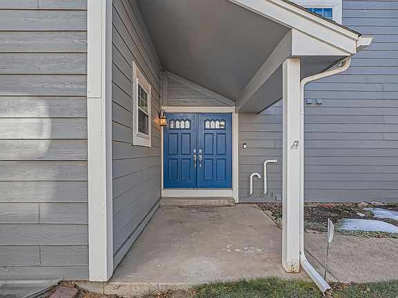 Front entry with covered porch / sitting area