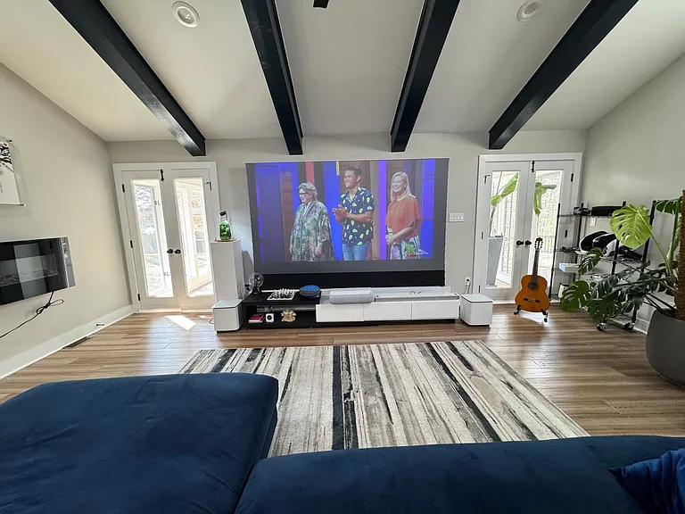 living room with projector, view from couch