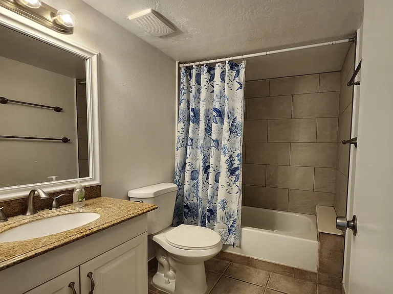 2nd bathroom remodeled in 2026 with ceramic tile walls_