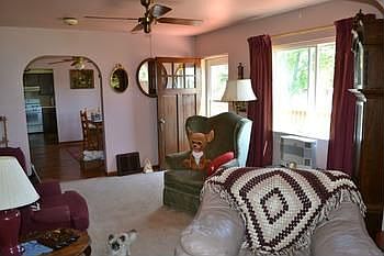 The living room is open to the dining area and you can even see all they way into the kitchen.