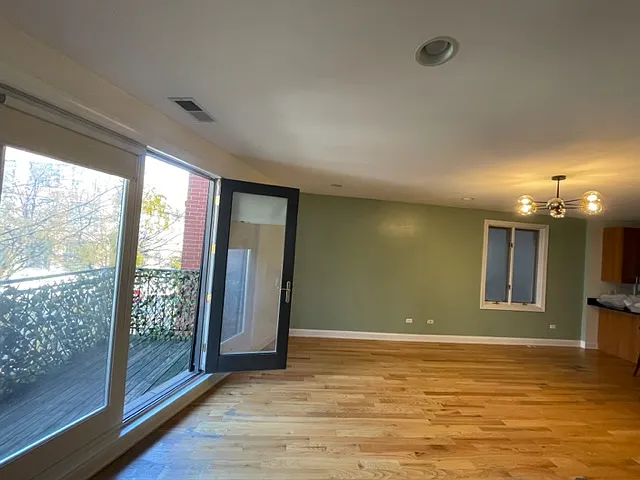 Living Room with Front Balcony- Privacy Foliage Included
