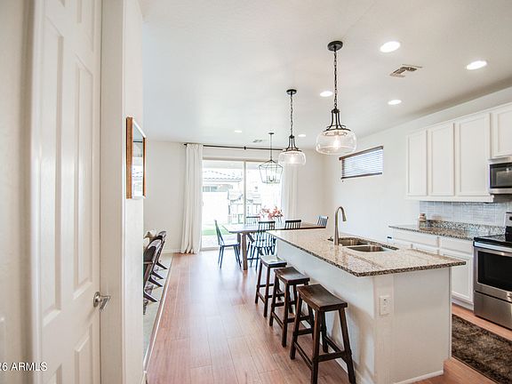 4th image of 9540 E Travertine Avenue