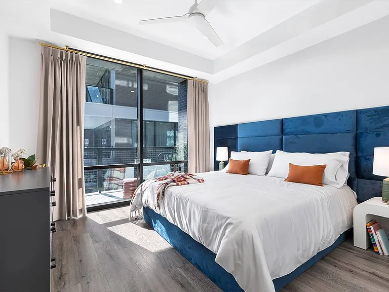 A1 Model Home: Bedroom with Pool View