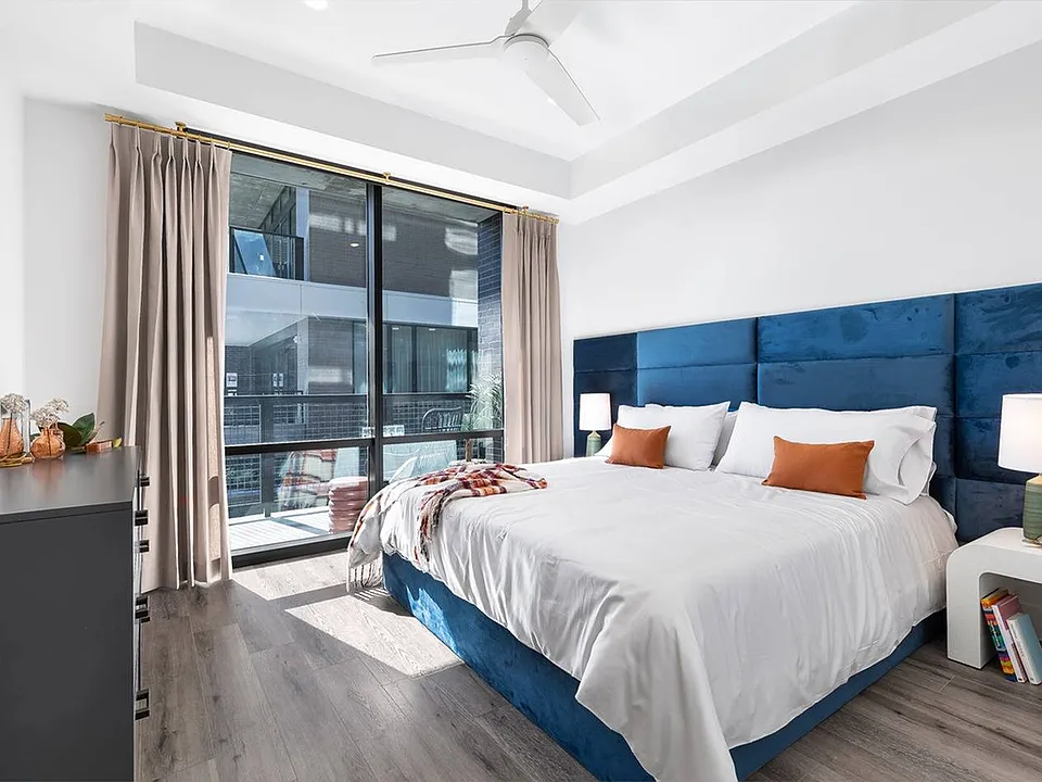 A1 Model Home: Bedroom with Pool View