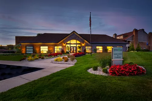 Leasing center at dusk - Willow Lake Apartments