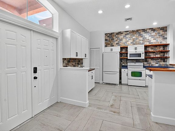 4th image of 15217 S Tranquility Lake Drive