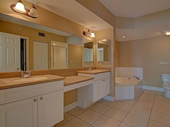 5th image of 4650 Links Village Dr Unit D402