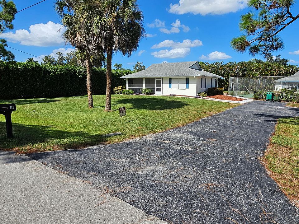Front entrance. Quiet street, in upscale neighborhood.