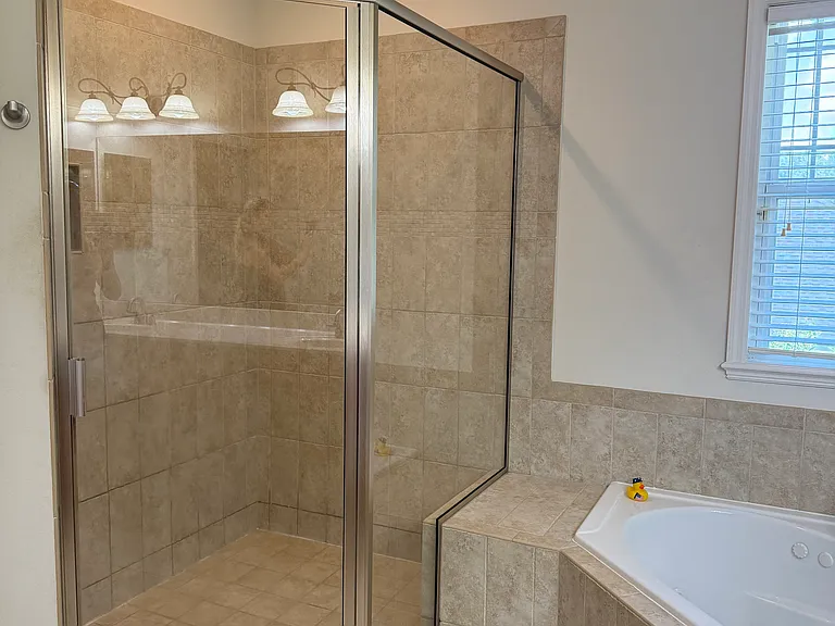 Walk-in shower in the en suite primary bathroom