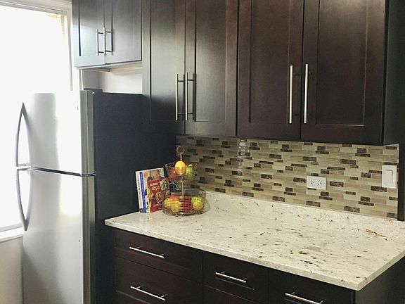 New kitchen with stainless steel appliances