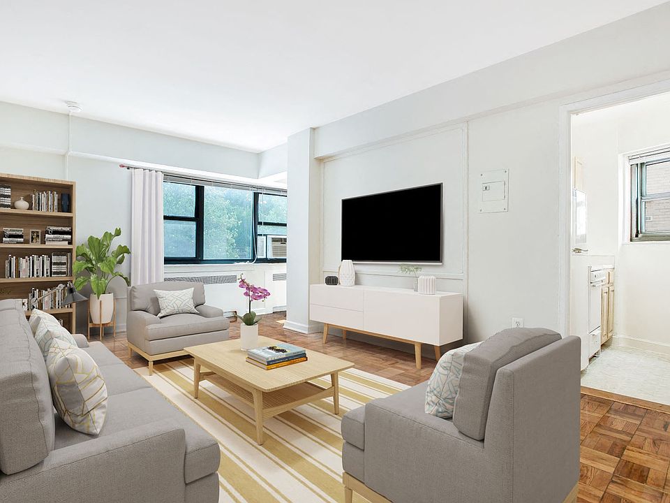 One-bedroom apartment living area (virtually staged)