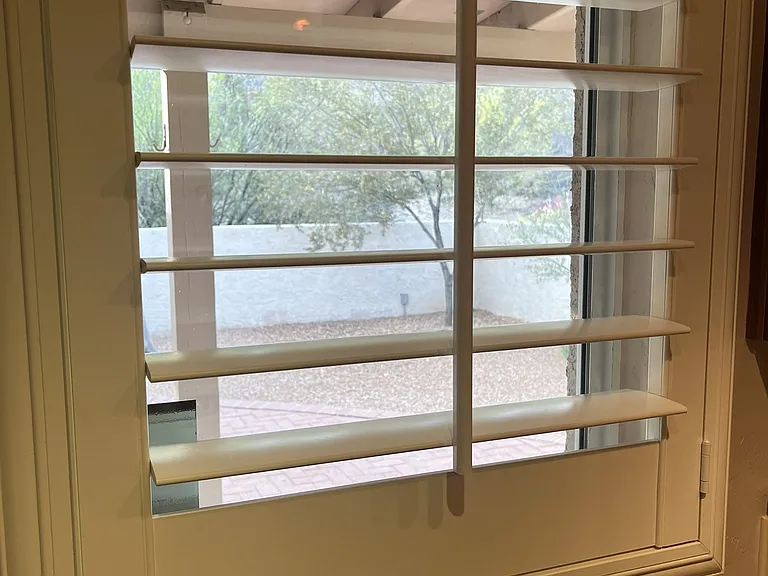 Kitchen window to back yard