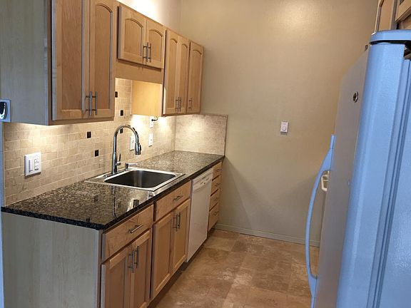 Kitchen with soft, indirect lighting under the cabinets and