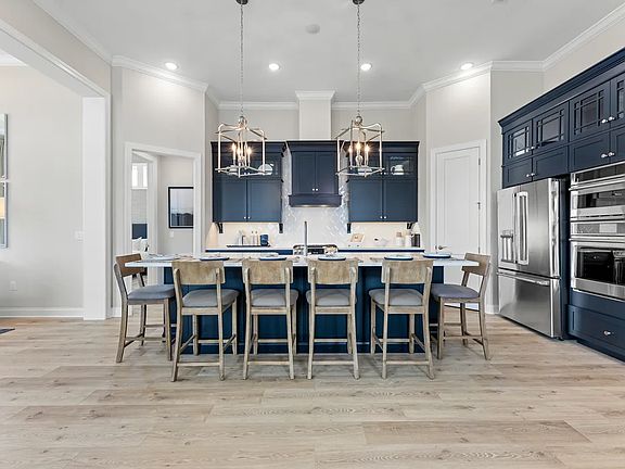 Kitchen with glass upper cabinets