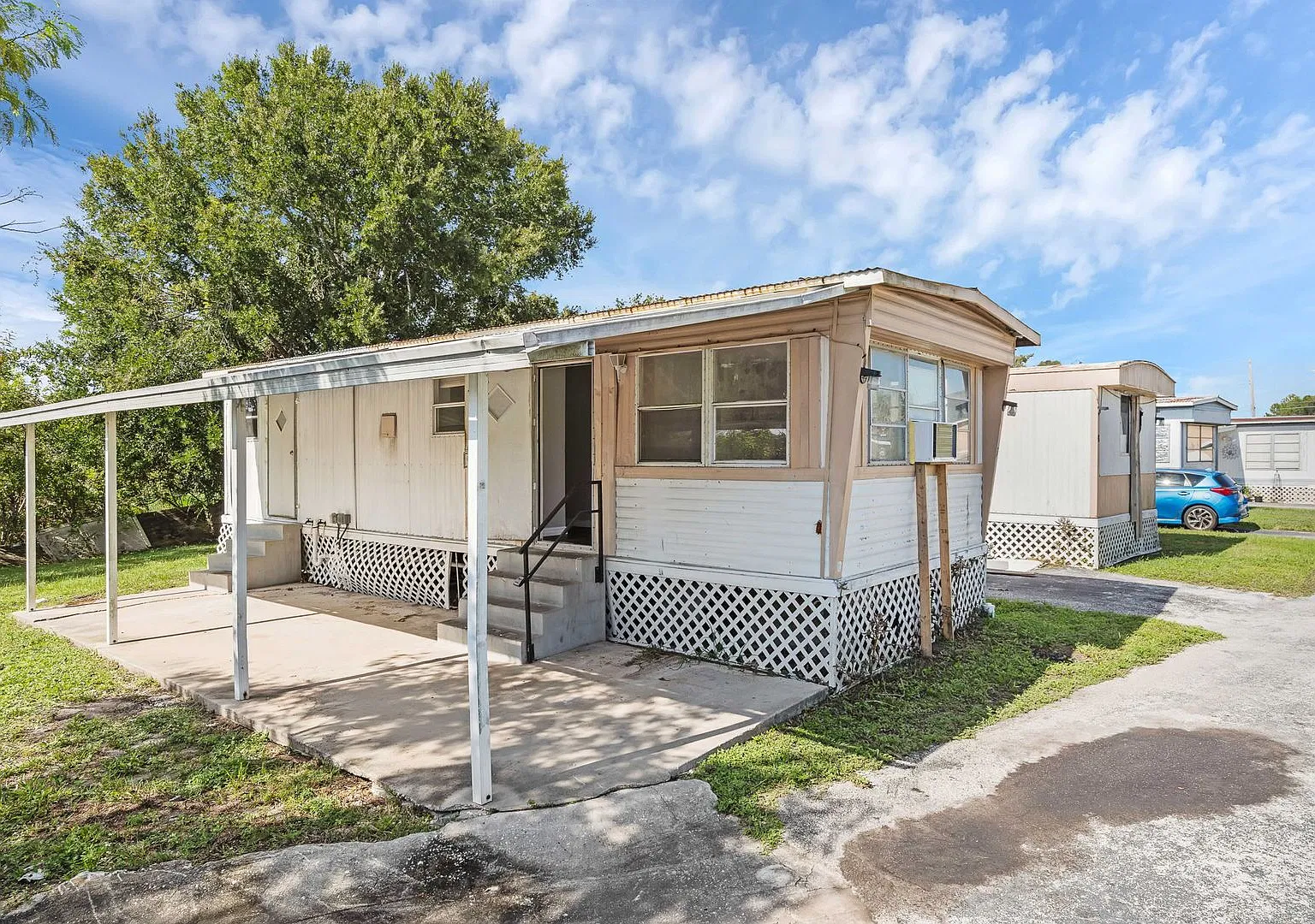 Welcome to thoughtfully updated 2-bedroom, 1-bath mobile home offering comfort, convenience, and ... — Photo 3