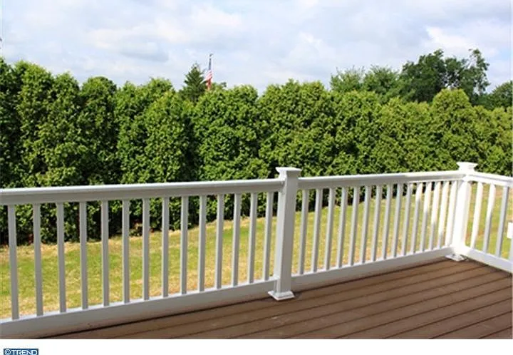 Back patio facing woods.