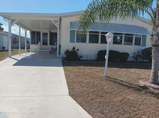 927 Dogwood Dr, Barefoot Bay, FL 32976