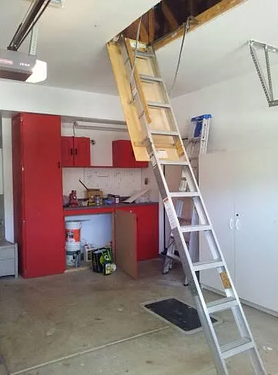 Workbench, Storage cabinets and Attic access & storage in the Garage