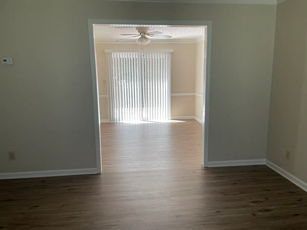 View of dining room overlooking the living room. - 182 Hunters Cv