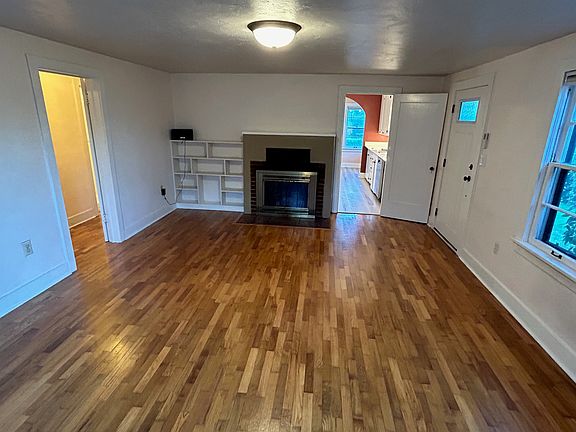 Living room oak floors and built-in bookshelf