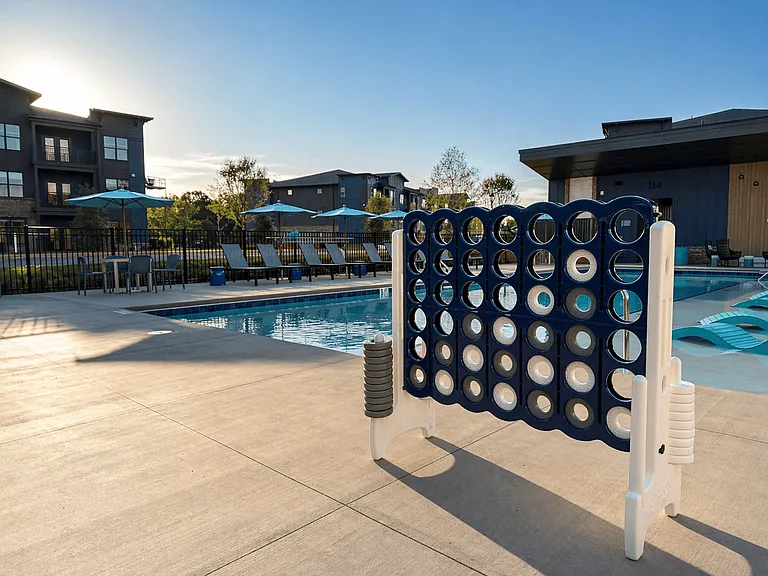 Our expansive sundeck boasts oversize games for entertainment.