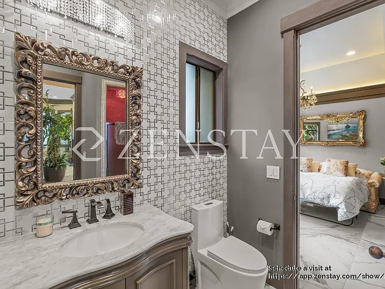 ground level den / bedroom with jack / jill bathroom