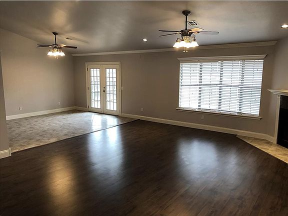 Living area view from the entrance to the home. Dining area & open floor concept