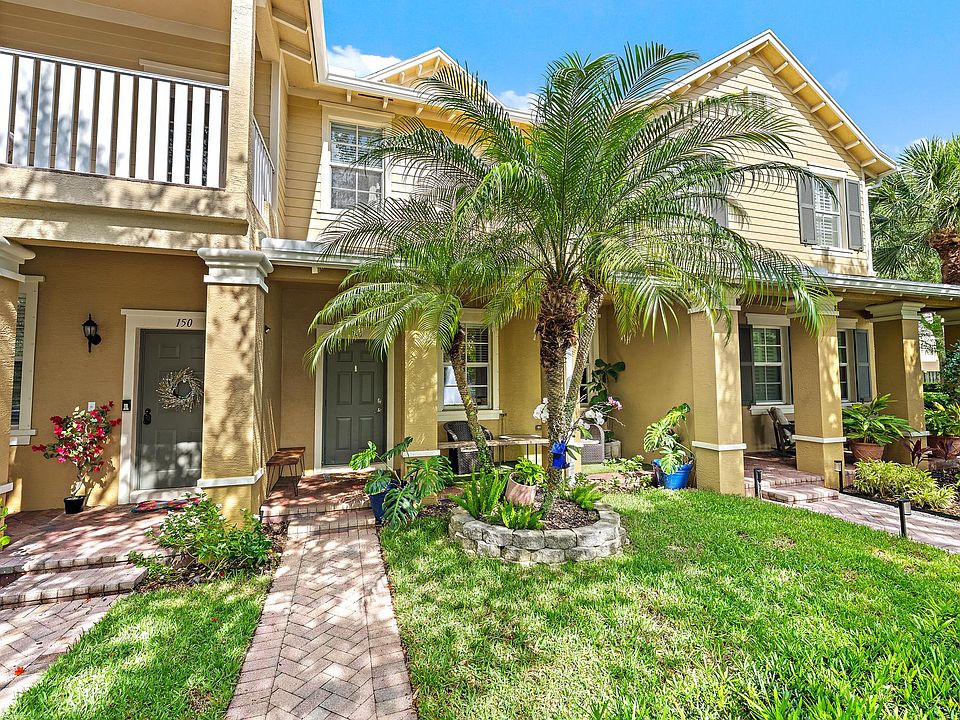 Front - 146 W Thatch Palm Cir