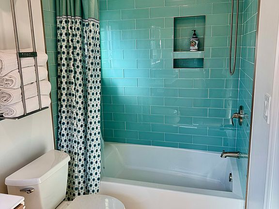 Full size bath and shower.