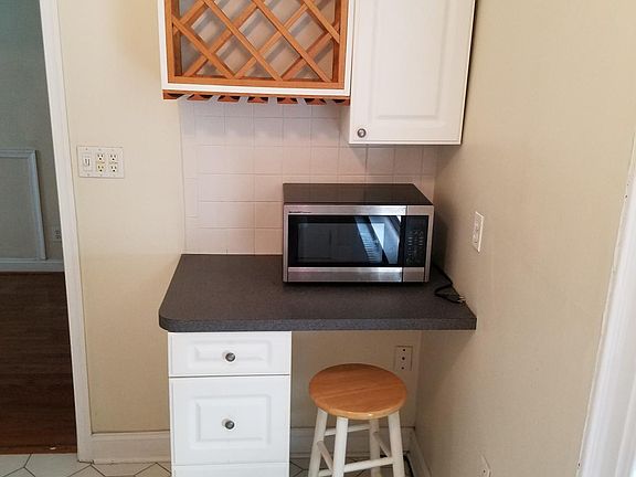 Wine rack and stainless microwave