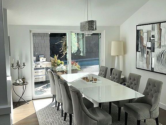 Dining room leading to huge hardscape patio....low maintenance!!