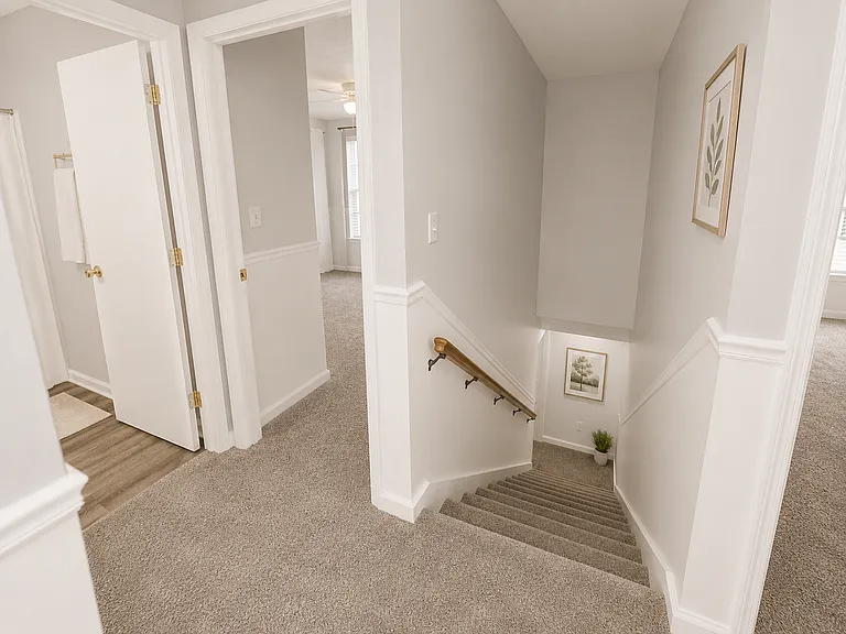 Modern updated duplex in Phenix City featuring central AC, stylish LVP flooring, updated kitchen with refrigerator and oven, spacious bedrooms, fresh paint, and excellent access to nearby shopping and dining.