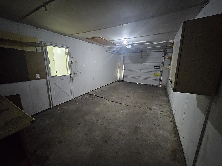 Garage - tons of storage space with built in cabinets and room for a full size truck.