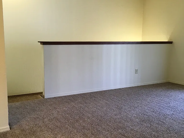 Living Room - Half Wall Overlooks Stairs (upstairs unit)