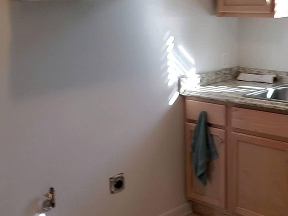 Stove and microwave will be included (not shown)! New tile flooring throughout kitchen!