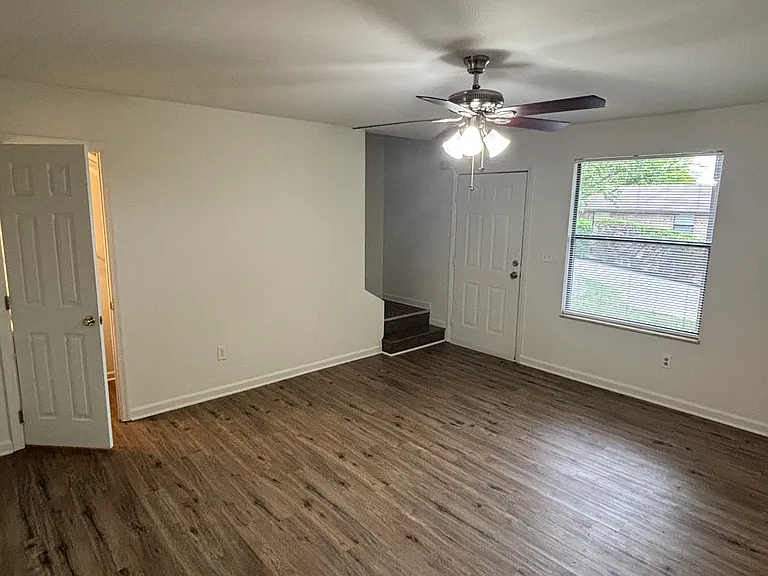 The living room with a half bath.