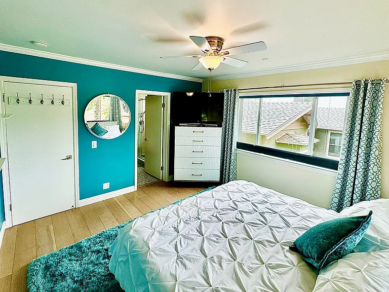 Master bedroom with brand new king mattress and all new furniture, ensuite full bathroom, new LG washer/dryer, walk-in shower, 52" Samsung smart TV with Apple TV streaming