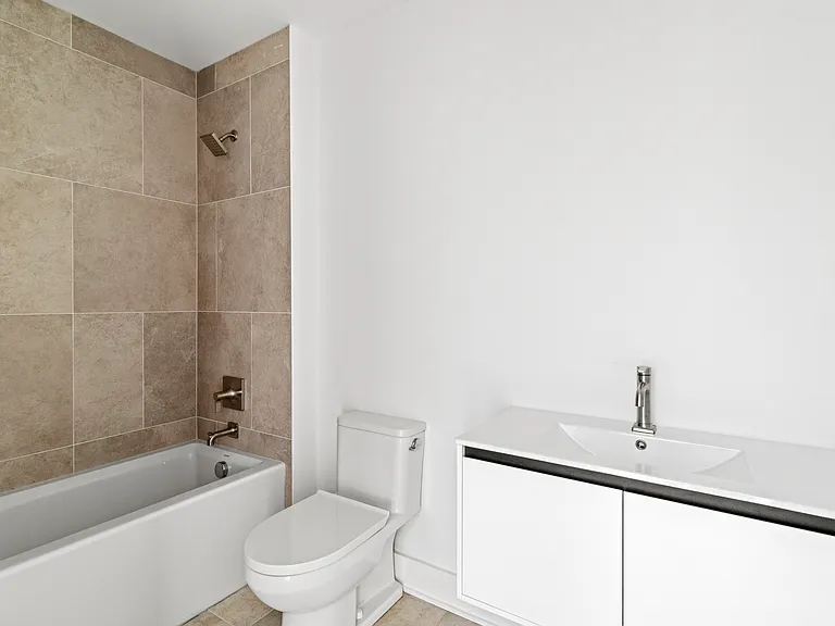 guest bathroom (mirrors and light fixtures have since been installed)
*photo of similar unit, exact finishes and layouts may vary*