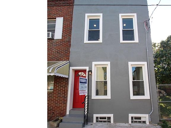 One of our favorite details - the bright red door!